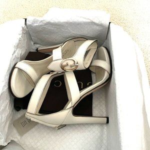 These sultry Gucci White Leather Saddle Soft Lux High Heel Sandals 36 EU